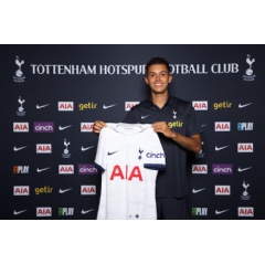 Brennan poses for a photograph with his new shirt