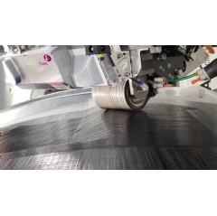 An automated fiber placement machine on an industrial robot is seen at Fives Machining Systems Inc. Fives is one of the new partners joining a NASA project that explores ways to speed up the production of composite aircraft.Fives Machining Systems In