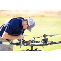 Pilot in command Brayden Chamberlain performs pre-flight checks on the NASA Alta X quadcopter during the FireSense uncrewed aerial system (UAS) technology demonstration in Missoula.
Credits: NASA ARC/Milan Loiacono