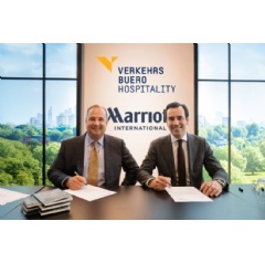 Signing ceremony with Marriott International President and Chief Executive Officer Anthony Capuano and CEO of VERKEHRSBUERO Martin Winkler