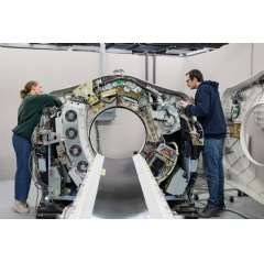 Block Imaging, an Apple Manufacturing Academy participant, hosts forum attendees at its facility for an interactive tour where they can see firsthand how the company has applied learnings from the program.