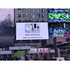 Dr. Albert H. Yurvati�s Books Shine on Times Square Billboard